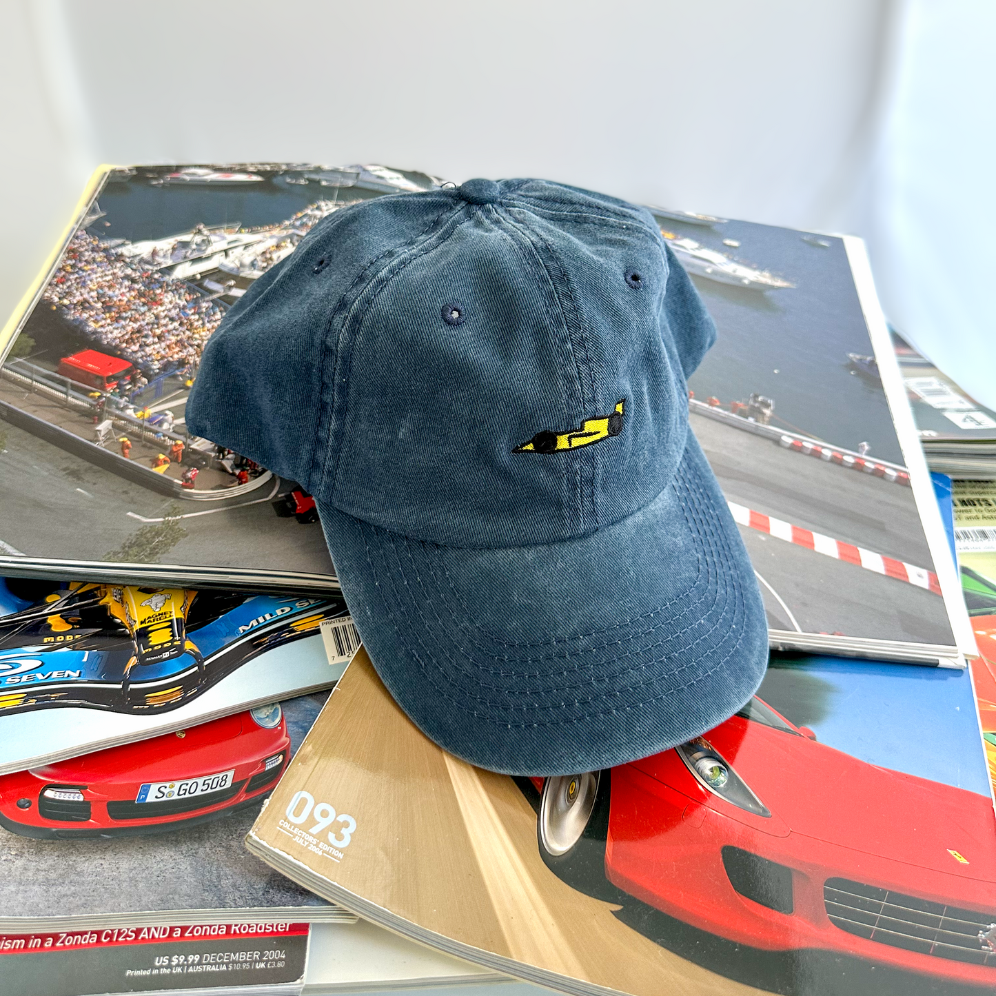 Yellow racecar on washed blue hat